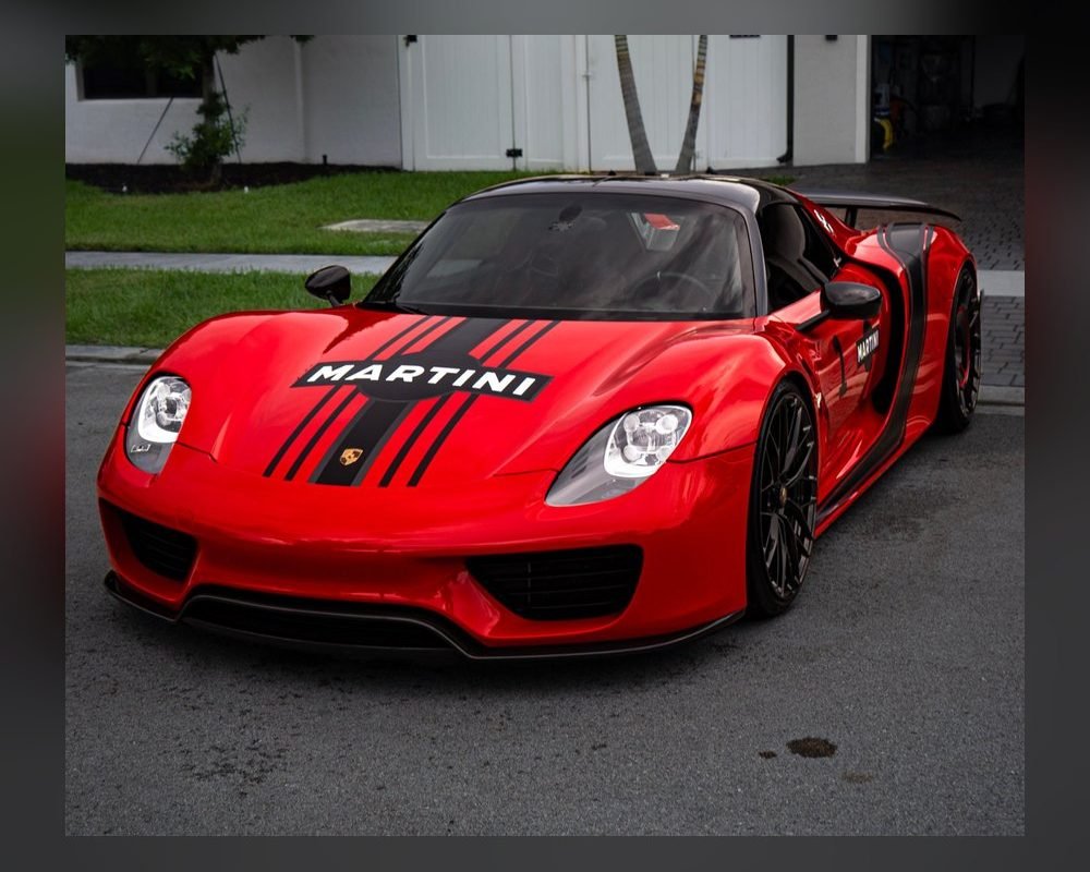 Red Porsche 918 Spyder after a Presidential Detail with paint correction